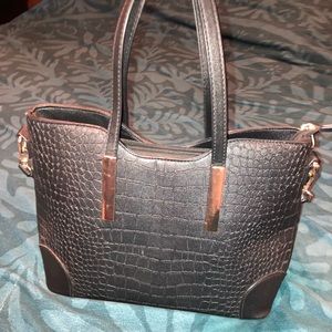 Black and gold handbag